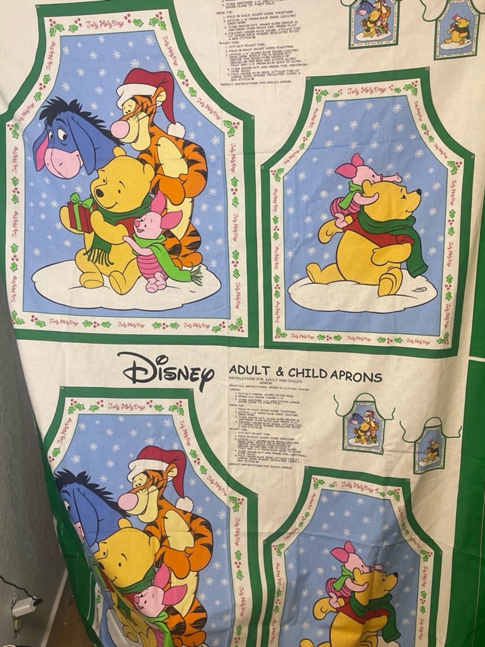 Disneys Winnie the Pooh Apron Holiday Pattern. 4 total, 2 adult, 2 kids.